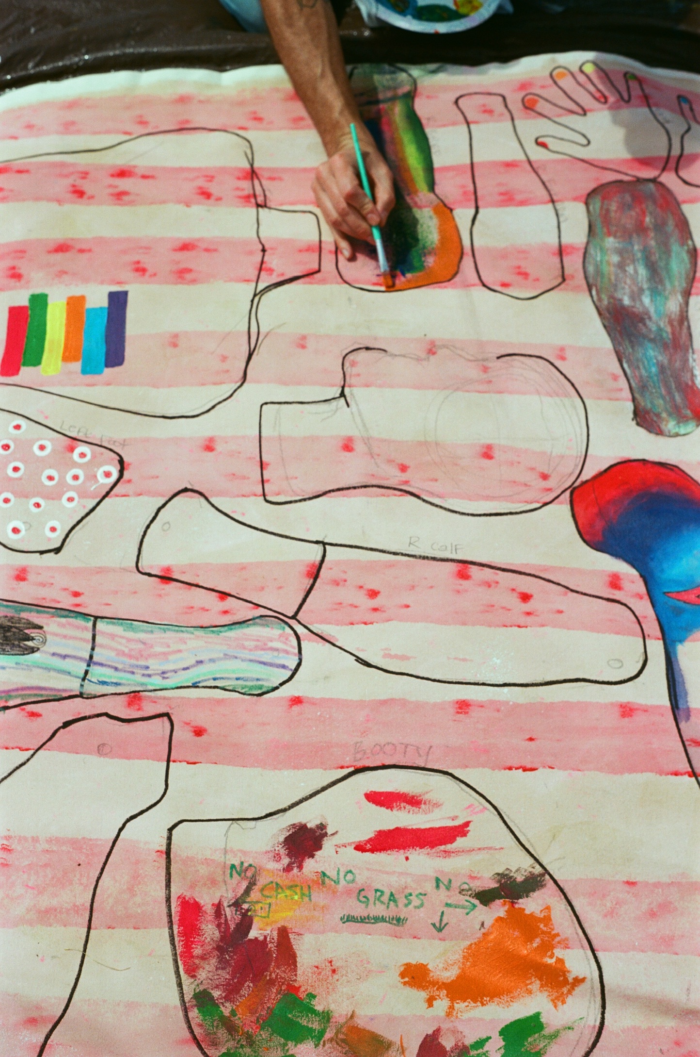A hand painting on a pink Surface/Self canvas.